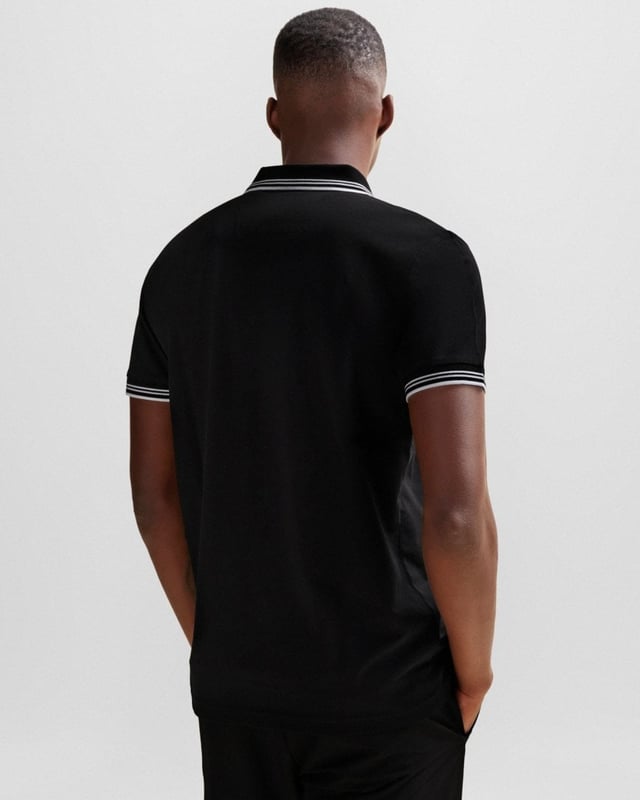 A contemporary polo shirt cut to a defined fit by BOSS Menswear, created in stretch cotton with contrast stripes and branding.

Slim fit
Flat-knit collar
Number of buttons: 2
Short sleeves
Flat-knit cuffs
Standard length
92% Cotton, 8% Elastane

50506193