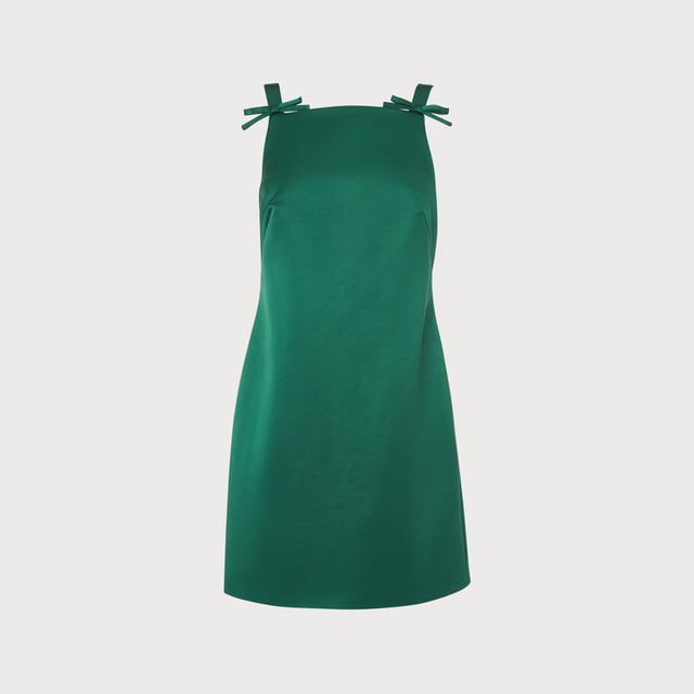 Short and chic, our Amalfi dress is a sumptuous new style in our partywear collection this season. Crafted from beautiful emerald green Italian satin, this statement dress has a square neckline, vintage-inspired bow detail to the straps, a close fit and a short, above the knee cut. Wear it with a sharp pair of flats or a towering pair of strappy sandals.