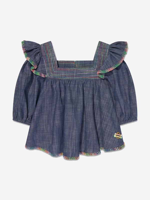Australian label Zimmermann combine superior cutting with spellbinding silhouettes. This monsoon denim top is reflective of the brand's commitment to originality and high quality detailing. Crafted with a multi-hued embroidered trim, it features a square collar, a flounced trim on the shoulders and puff sleeves. It is complete with a small embroidered bee logo above the hem. Matching shorts are also available. Pure Cotton Button Fastening on Reverse 100% Cotton