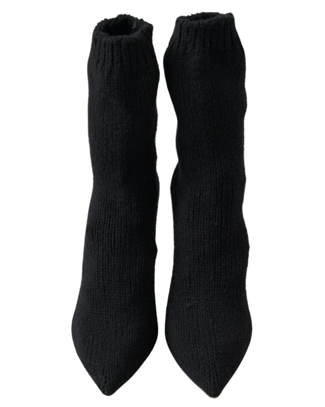 <ul>
  <li>Botas de media cana 100% autenticas de Dolce & Gabbana</li>
  <li>Diseno de tacon de aguja negro</li>
  <li>Hecho de material de viscosa de alta calidad</li>
  <li>Suela de cuero</li>
  <li>Detalles del logotipo</li>
  <li>Fabricado en Italia</li>
  <li>Elegante y comodo</li>
</ul>