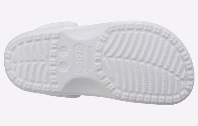 Slip into your favourite clog and enjoy a custom fit, water-friendly design and ventilated, breathable forefoot. The Croslite footbed moulds to your foot for a custom fit with excellent arch support. Crocs Classic, perfect for beach or boat.
- Our iconic Classic Clog
- Fully molded Croslite material construction for lightweight cushioning
- Massage pod footbed feels good
- Heel strap for a more secure fit
- Non marking Croslite material outsole
- Room for Jibbitz charms
- Comfort Rating: Iconic
- Take the plunge! Buy a pair of Crocs Classic, the perfect shoe for beach or boat