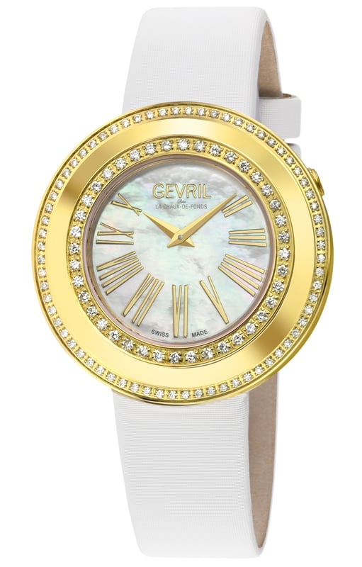 Gevril’s Swiss Diamond Watch from the Gandria Collection elicits a dreamy quality only known to those with a knack for nostalgia and an eye for elegance. It is beauty preserved, because true style never goes out of date.
The picturesque town of Gandria, with its lake views and surrounding mountains, is best known for its harkening to days gone by, and this absolute revelation of a timepiece captures that essence like no other. In a brilliant testament its moniker, Gandria features a 36mm round stainless-steel case in a warm bronze color that resplendently highlights a selection of beaded or diamond accents.  With either a half carat of 40 diamonds on the inner case or close to a carat of 108 diamonds on the outer case, each design forms two captivating concentric circles surrounding a serene and stylish mother of pearl dial and Roman Numeral endices.
Inaccessible by car, Gandria is untouched and unmarred by time, and Gevril’s Swiss Quartz movement proves that history this well-built needs no tampering.  Completed by a lustrous satin strap, tang buckle and hidden push/pull crown, this charming watch has a subtle ability to completely enthrall any room.
This collection exists in a world where modern luxury attempts to be loud, bold, yet Gandria stands out for being softly, authentically regal. An ode to a true, original beauty Gevril’s Gandria is a breathtaking classic for the ages.
Gevril 12221 Women's Gandria Swiss Quartz Diamond Watch Gevril Women's Swiss Diamond Watch from the Gandria Collection 36mm Round IPYG Diamond Case, White MOP dial 108 Diamonds on Outer Case, 0.84 TCW, Clarity VS, Color FG Hidden Push/Pull Crown, Roman Numeral Genuine Silver Satin Strap with Tang Buckle Anti-reflective Sapphire Crystal 5 ATM (50 Meters 165 Feet) Swiss Quartz Movement Ronda 762