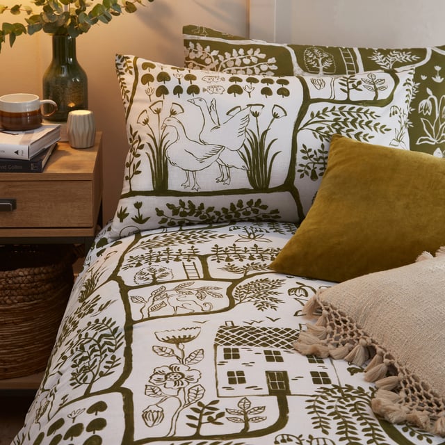 There is always something new to spot on the Frida duvet cover set! The intricately designed abstract drawings are a modern take on folk art and is inspired by the green tones found in nature, bringing it indoors to reconnect and rejuvenate. The moss coloured side is ideal to create a cocooning, nature inspired space, while the transitional designed reverse offers a fresher alternative, with a white base to add lightness to any space. An amazingly abstract and quirky duvet cover set which adds a fun rustic feel to your bedroom.