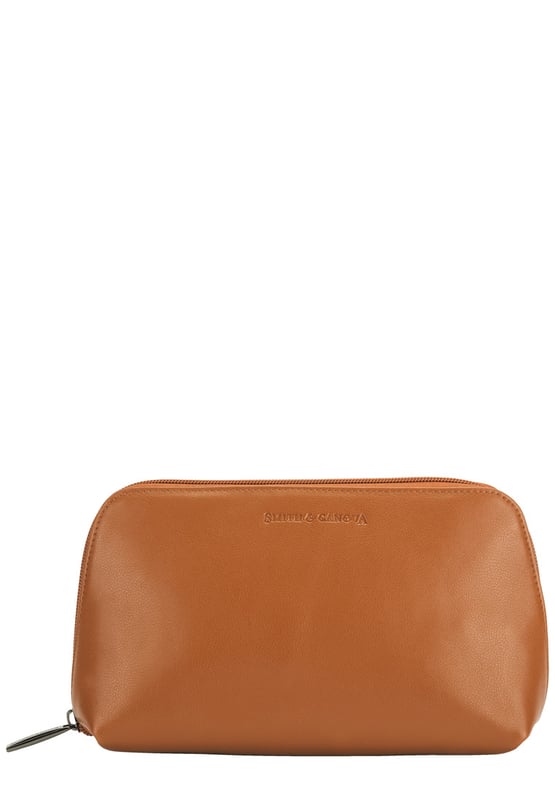 This staple zip around cosmetic bag in genuine leather, inside features a zip pocket, elasticated pocket and elasticated cosmetic holders. This minimal design includes a debossed logo and gunmetal zip pull. Features: , Zip around fastening, Smith & Canova debossed logo, Smith & Canova branded interior, Inner zip pocket, Elasticated pocket, Genuine Leather Style Ref: 26833 TAN