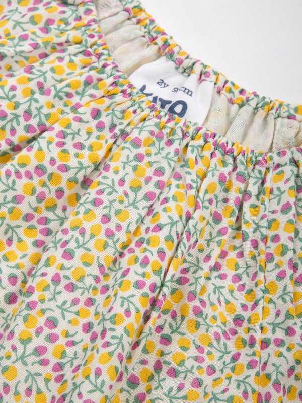 100% organic cotton | Proud to be certified to the Global Organic Textile Standard (GOTS) | Little bud all-over print | Double layer muslin fabric | Short sleeved | Elasticated neckline and cuffs | Made in India | Machine washable at 40 degrees, or at 30 degrees to be kinder to the planet