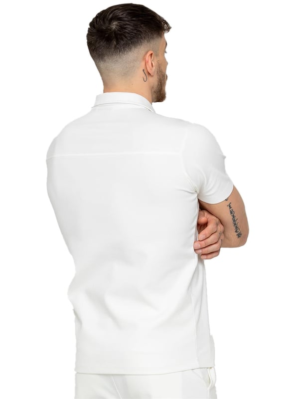 Upgrade your summer wardrobe with the Enzo Milano Short Sleeve Polo Shirt. Made from premium quality fabric, this polo shirt ensures both comfort and durability. Designed with a straight hem for a clean and polished finish, it features an open collar that elevates its appearance to a refined, premium level. Ideal for adding a touch of sophistication to any outfit, this Regular Fit polo shirt comes with a convenient zip fastening.