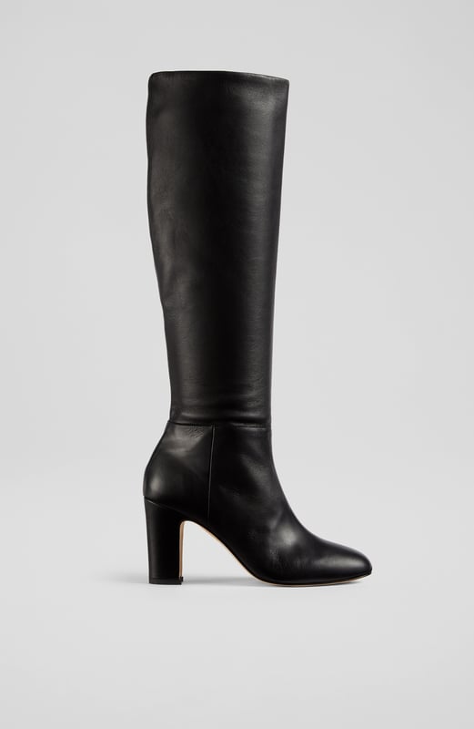 Our black nappa leather Kristen boots will help you transition seasons with ease. Effortlessly stylish, they sit just below the knee and feature a slim, block heel for a flattering finish.