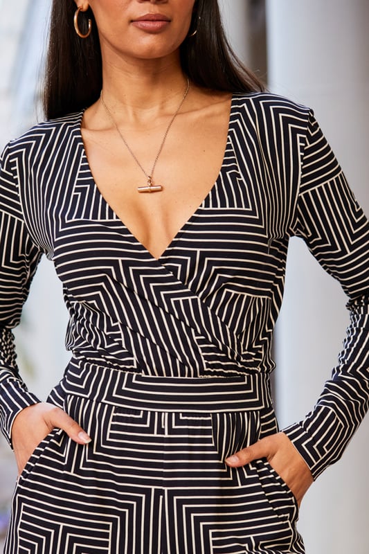 Dressing up doesn't always mean dressesYou'll love the flattering wrap frontElongating wide legsSoft and stretchy fabric for style and comfortStyle with gold hoops and platforms for big night out vibesInside leg to fit: Short 29" | Regular 31" | Long 33"