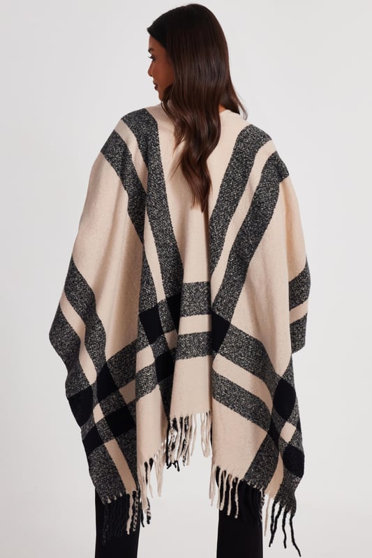 - Check print - Tassel finish - Cape style - One size - Always check the care wash label - Cool hand wash with mild detergent