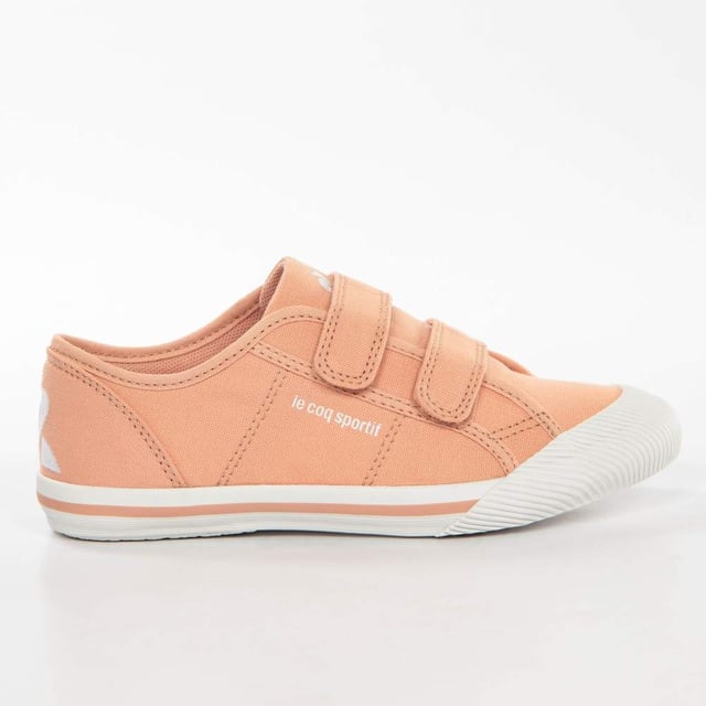 Basket Le Coq Sportif Deauville PS Sport Mädchen Rosa Textil. Authentischer Freizeitschuh der Marke Le Coq Sportif - Straßenmode/Sportswear-Design von Le Coq Sportif - Le Coq Sportif für modebewusste Mädchen, perfekt für den Alltag - Der rosa Le Coq Sportif Basket lässt sich ideal mit dem Rest Ihrer Garderobe kombinieren - Bequemes Textilmaterial - Klassischer Klettverschluss - Deauville PS Sport - Textil.