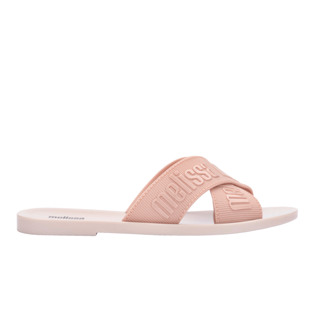 Join the multistrap trend with the Melissa M Lover Slide, the ticket to becoming a footwear icon! Lightweight and available in a variety of delightful colors, the sandal is inspired by the current fashion scene and features the unmistakable Melissa charm. Grab the perfect pair, pronto!