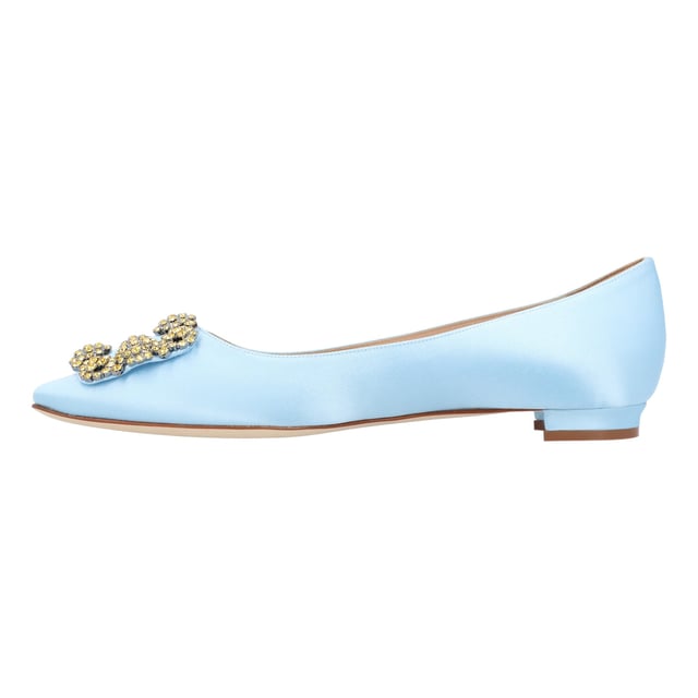 HANGISI FLAT Satin Jeweled Buckle Shoes Ballerina Blue
Light blue satin almond toe ballerina flats featuring a square jewel buckle with yellow crystals.
Upper: 72% viscose, 28% silk.
Sole: 100% calf leather.
Lining: 100% kid leather.
Made in Italy.Measurments: