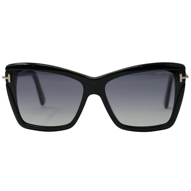 Tom Ford Leah FT0849 01B Black Sunglasses. Lens Width = 64mm, Nose Bridge Width = 15mm, Arm Length = 135mm. Made In Italy, Tom Ford Black Sunglass. Branded Sunglasses Case and Cleaning Cloth Included. 100% Protection Against UVA and UVB Sunlight and Conform to British Standard EN 1836:2005. Tom Ford Leah FT0849 01B Sunglasses