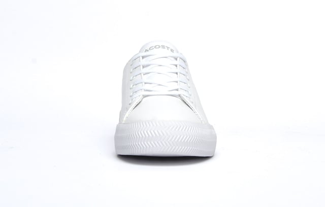 Lacoste Gripshot Womens Trainers With its premium leather construction and classic, low-profile silhouette presented in a smart white colourway, the Lacoste Gripshot delivers a look thats both casual and stylish. Full of designer touches, premium craftmanship and finished off with the famous Lacoste Croc on the side, this no-nonsense trainer will deliver a touch of laid-back style to any casual or dress outfit.
- Premium Leather upper
- 6 eyelet lace up fit
- Ortholite footbed
- Textured vintage styled midsole
- Durable rubber outsole
- Lacoste branding throughout
PLEASE NOTE:
These Lacoste trainers are sold as B grades which means there may be some very slight cosmetic issues on the shoe and they come in a Lacoste box with the Lacoste brand authenticity details attached to it. We have checked every pair of these shoes and in our opinion at these heavily reduced prices all are very saleable. All shoes are guaranteed against fair wear and tear and offer a substantial saving against the normal high street price. The overall function or performance of the shoe will not be affected by cosmetic issues. B Grades are original authentic products released by the brand manufacturer with their approval at greatly reduced prices. If you are unhappy with your purchase we will be more than happy to take the shoes back from you and issue a full refund. Possible imperfections may include some, all, or on some occasions none of the issues stated: Scuff marks to the upper; glue spots to the upper; general discolouring imperfections to the upper, occasionally some discolouring of the sole. If there are visible marks on the shoe which is very rare, once the shoes have been worn two or three times any initial marks will blend into the overall appearance of the shoes.