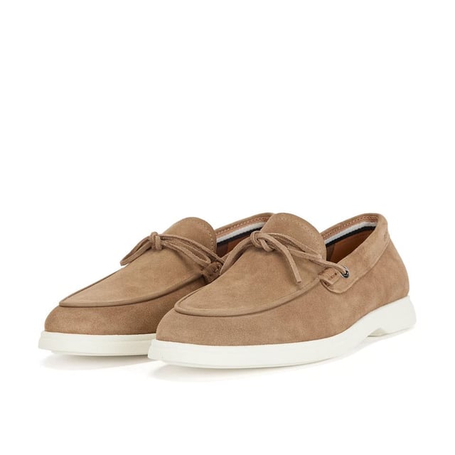 . A slip on shoe with suede uppers featuring decorative tassels across the vamp in brown suede and all over brown stitch details. Two silver branded eyelets situated on the outstep and instep with the signature BOSS logo embossed on the outstep of the heel. A textured rubber midsole in off white with a branded and textured rubber undresole in off white.