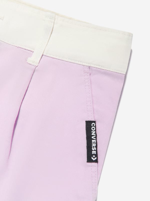 Converse combine 70s nostalgia with new innovative properties. These girls colour block stardust lilac shorts are reflective of the American label's preference for authentic streetwear via a reconceptualised utilitarian outlook. Crafted in a pleated front effect via side and back pockets. They will be a summer favourite. ‚ Belt Loops ‚ Front Button ‚ 97% Cotton, 3% Elastane