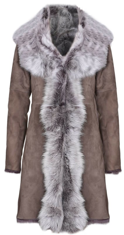 A testament to the luxury appeal of sheepskin, this slim fit jacket is proudly manufactured in our London factory by our veteran craftsmen. This coat comes in 8 of our finest colourways and is characterised by the generous exposure of sheepskin at the front for an extravagant and classy look. This jacket comes with a pocketless finish and the seams at the jacket edges are all left natural for a classic look. We’ve crafted this jacket from Spanish Toscana wool which is renowned for being among the most soft and silky sheepskins and the result is a jacket which is unquestionable in terms of quality and unparalleled in its provision of warmth and comfort. Upon request we can make this jacket in any length that you wish to ensure that you can enjoy this piece to its fullest potential, please feel free to contact us by email. • Crafted from high-quality double-faced sheepskin • Thick sheepskin lining is renowned for providing warmth and comfort • Features a luxurious revere collar that fastens with hooks and loops • Available in 8 different colours • Custom orders for different jacket lengths are available upon request