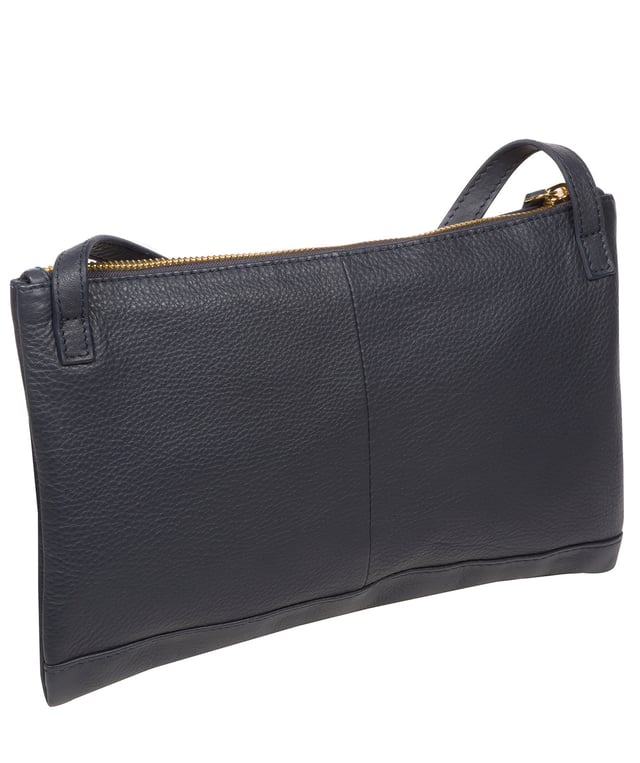 Crafted from high-quality Nappa leather, the 'Anya' cross body bag from Pure Luxuries London's Marylebone Collection is a must-have thanks to the super soft-to-the-touch feel and finish. A stylish zip-over top secures the central compartment which is lined with 100% cotton for a flawless look. Additional storage is provided by three card slots and a slip pocket, perfect for all your essentials. This accessory is adorned with a slim and adjustable strap with a maximum drop length of 65cm and complemented by eye-catching gold-coloured metal fittings and zips which give it an elegant look. The Pure Luxuries logo is embossed for an effortless and sophisticated finishing touch.