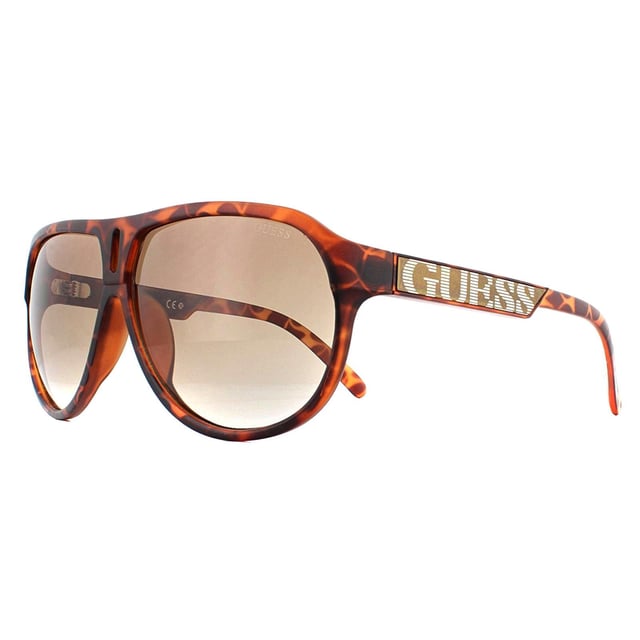 Las gafas de sol Guess GU6729 S57 Tortoise Brown Gradient son una montura de alta calidad hecha de plástico con forma de mosca y están diseñadas para hombres