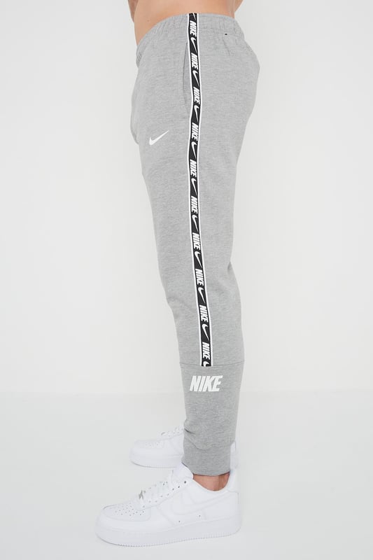 Nike gel tape cuffed hot sale tracksuit