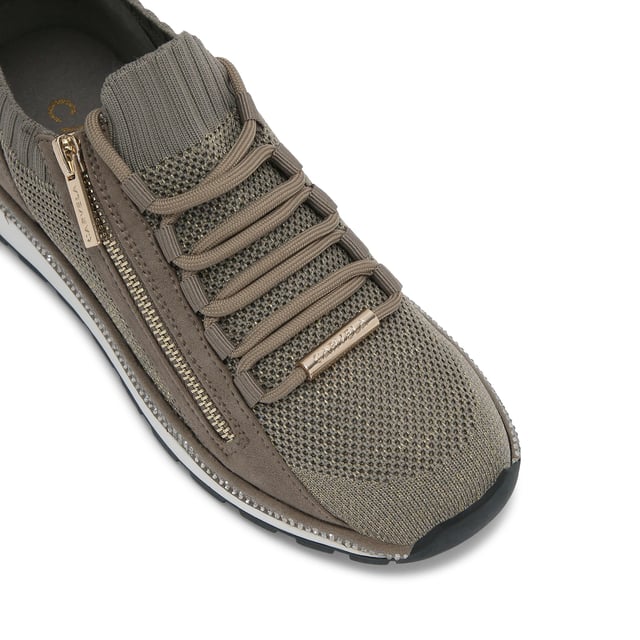 This Carvela Pace Zip Knit trainer features a bronze fabric upper with slight glimmer. The front laces are tubular with a gold zip on the eye stay. There is a silver crystal panel around the midsole.