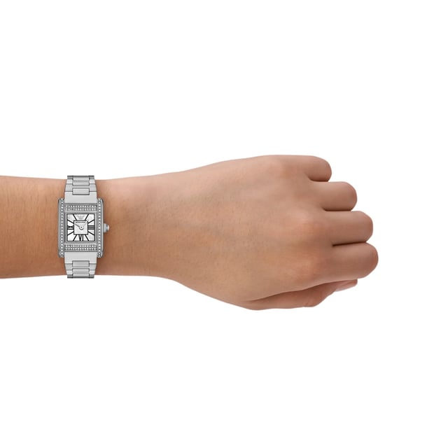 This Emporio Armani Genni Analogue Watch for Women is the perfect timepiece to wear or to gift. It's Silver  Rectangular case combined with the comfortable Silver Stainless steel watch band will ensure you enjoy this stunning timepiece without any compromise. Operated by a high quality Quartz movement and water resistant to 5 bars, your watch will keep ticking.
