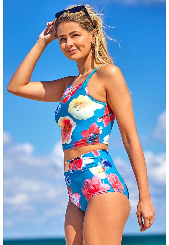 Conjunto de Tankini con Tirantes de Espagueti y Estampado Floral, Elegante y a la Moda  
  Presenta un hermoso diseño de estampado floral  
  Tirantes de espagueti para un ajuste cómodo y ajustable  
  Confeccionado con materiales de calidad  
  Duradero y de larga duración  
  Perfecto para vacaciones en la playa, fiestas en la piscina o para relajarse junto a la piscina  
  Disponible en varias tallas  
  Diseñado para realzar diferentes tipos de cuerpo  
  Mantente a la moda y con confianza