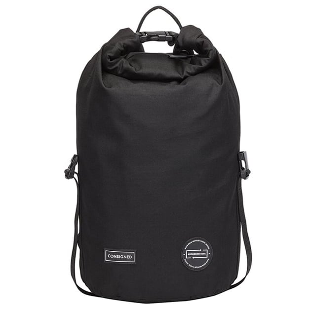 The Cornel M Roll Top Backpack, our most versatile bag to date, is made of RE-CONSIGNED outer & lining fabric, produced from 100% recycled plastic bottles - Global Recycled Standard certified fabric. The roll top design features a concealed waterproof zip to the main compartment, for extra security, paired with a no fuss quick access top waterproof zip pocket. A double clip feature allows multi-functional use, enabling the bag to transform into 3 different designs depending on your needs. Inside ensures maximum functionality with a generous internal capacity and 13 Inch padded laptop sleeve. Features: , RE-CONSIGNED ripstop outer fabric made from 100% recycled plastic bottles - Global Recycled Standard certified fabric, RE-CONSIGNED lining made from 100% recycled plastic bottles - Global Recycled Standard certified fabric, 32 Plastic bottles saved from landfill in the production of this product, 16 Litre internal capacity, Water Resistant, 13 inch padded laptop sleeve & nested 9.7 inch tablet pocket with Velcro fastening, Roll top opening to main compartment with hidden internal waterproof zip for extra security, Quick access top waterproof zip pocket, Rear secure access waterproof zip pocket, Internal zip pocket for smaller valuables, 2 Internal mobile phone slip pockets - Fits normal and plus size smart phones, 3 Internal pen slip pockets, CONSIGNED seal of approval rubberised patch logo, RE-CONSIGNED seal of approval rubberised patch logo, CONSIGNED branded webbing, CONSIGNED branded lining, Ergonomic contoured back panel, Adjustable padded backpack straps, Top grab handle, Rubberised zip pullers, Medium model, Double clip feature which allows the bag to transform into 3 different designs Style Ref: 50516 BLACK