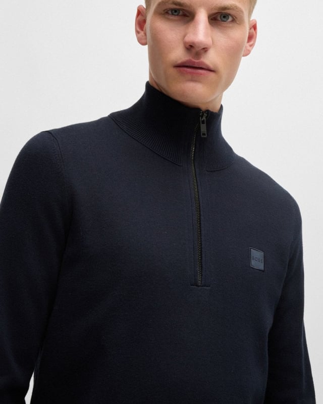 A regular-fit sweater trimmed with a logo patch by BOSS. This zip-neck layer is blended with cashmere for a super-soft touch. This product is partly made with organic cotton. Our organic standards do not allow the use of synthetic fertilisers, pesticides or genetically modified seeds.

Regular fit
Stand collar
Long sleeves
Standard length

95% Cotton, 5% Cashmere
50527585
 