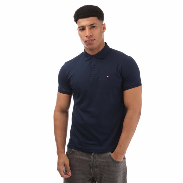 Mens Tommy Hilfiger Regular-Fit Polo Shirt in blue.- Polo collar.- Short-sleeved.- Two-button placket.- Tommy Hilfiger branding.- Tommy Hilfiger flag embroidery on chest.- Regular fit.- Ref: MW0MW35585DAF