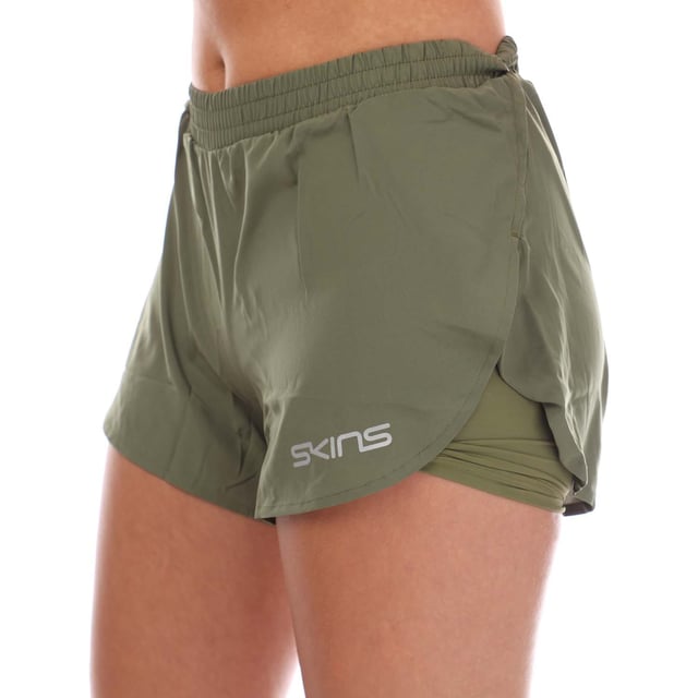 Womens Skins Series-3 Superpose Shorts in khaki.- Elasticated waistband.- Hidden mesh panel pocket.- 2-in-1 tights with over-short.- Medium compression profile for everyday comfort and support.- Silver reflective logos.- 100% Polyester.- Ref: ST40300120573