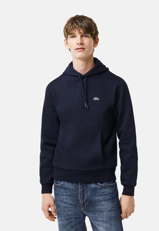 Trendy, warm, lightweight: a must-have for the crocodile wardrobe. Plain-coloured hooded sweatshirt with a kangaroo pocket and logo patch in a modern silhouette.