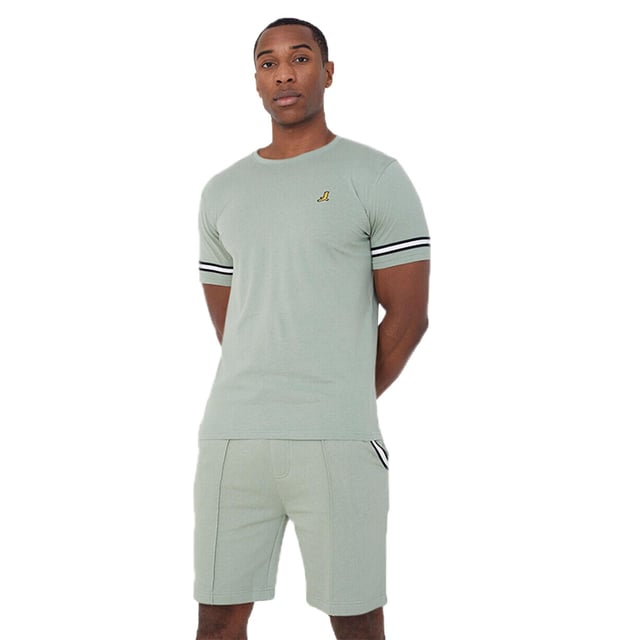 Get ready to embrace endless comfort and style this season with this t-shirt and shorts set from Brave Soul. Crafted from 100% cotton, the crew neck t-shirt features tape detail on the sleeves and embroidery detail on the chest. The matching shorts are made from a soft cotton blend and feature pintuck detail and two waist pockets. This set is the ultimate addition to your casual wardrobe. Model wears UK size M.