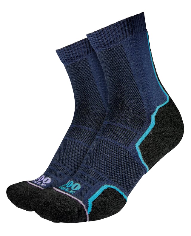 1000 Mile Women's Single Layer Sock 2 PackIntroducing the Women's Trail Repreve Single Layer Sock - the ultimate companion for trail running, fell running, and mountain biking. Designed with your comfort and support in mind, this 1000 Mile Trail Sock is anatomically crafted to enhance your off-road adventures. Its padded heel safeguards the achilles tendon, toes, and ball of the foot. By incorporating cutting-edge REPREVE® recycled yarns, these socks minimize friction, efficiently wick away moisture, and dry rapidly. With arch bracing for a secure fit, you can say goodbye to slippage. Available in Navy, these socks are composed of 56% REPREVE® Nylon, 22% acrylic, 20% wool, and 2% elastane. Ladies can choose from two sizes: Small (3-5.5UK, EUR 36-38.5) or Medium (6-8.5UK, EUR 39-42.5). Upgrade your outdoor excursions with these exceptional socks!Extra Product DetailsPerfect for trail running, fell running, and mountain biking.Provides comfort and support during off-road activities.Padded heel protects achilles tendon, toes, and ball of the foot.Reduces friction and wicks moisture for dryness.Customized fit with no slippage due to arch bracing.Made with REPREVE® recycled yarns for sustainability.Stylish Navy color option available.Comes in two sizes: Small and Medium.