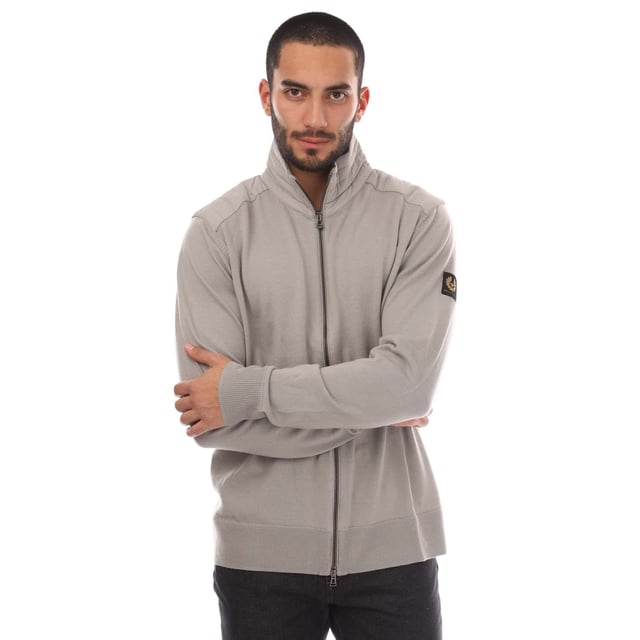 Mens Belstaff Merino Wool Kebly Zip Cardigan in grey.- Stand-up collar.- Exposed two-way zip closure.- Ribbed cuffs and hems.- Channel-quilted shoulder reinforcement.- Embroidered-edge Phoenix patch on left sleeve.- Military-inspired knit cardigan.- 100% Wool.- Ref: 104861CRGRY