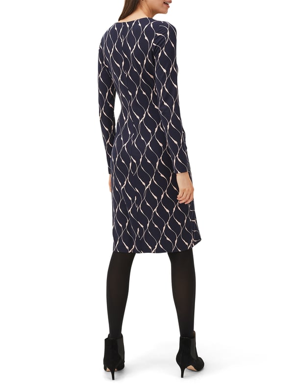 Discover the elegant Ally Print Dress in Navy, perfect for any casual or formal outing. A blend of comfort and style.