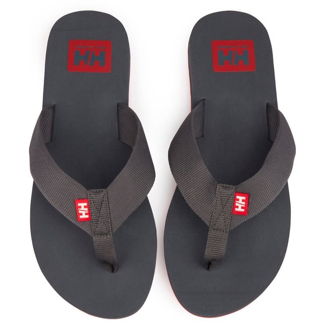 Get Going With A Summer-sun-and-beach Vibe In The Logo Flip-flop Sandals From Helly Hansen. They Are Crafted From 100% Recycled Polyester Webbing And A 30% Recycled Rubber Sole, Epitomising Sustainable Summer Style. Their Branded Footbed Adds A Dash Of Chic, While The Recycled Materials Provide Unprecedented Comfort. Every Stride Leaves A Lighter Footprint On Our Planet, Making Them The Perfect Blend Of Fashion And Eco-friendliness.