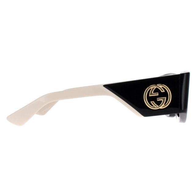 Gucci Rectangle Womens Black with Ivory Grey GG1664S  Sunglasses boast an elegantly oversized silhouette with sharp, clean lines and a touch of retro charm. The sophisticated frame is accentuated by Gucciâ€™s iconic double-G logo on the temples, symbolizing luxury and fine craftsmanship. Equipped with premium lenses that provide superior UV protection, the GG1664S ensures both style and functionality. Available in a variety of striking color options, these sunglasses are perfect for fashion-forward individuals who seek to express their unique sense of style with a touch of timeless elegance.