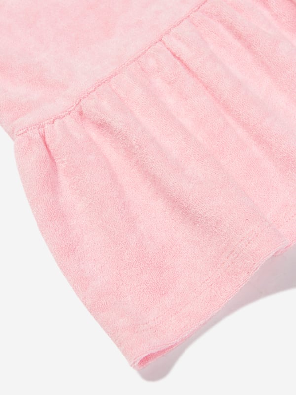 Comfort and style converge for this girls pink knit dress from AY by Ayla. Designed for young influencers, this cosy fleece piece is made for dreaming big with a fashionable twist. Perfect for playdates as well luxe lounging, the soft, lush fabric ensures that feel good factor. Roundneck Collar Dropped Waist Pleated Skirt