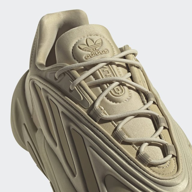 adidas may be a long way from the '90s, but these Ozelia Shoes are rooted in that loud, experimental era. Inspired by the adidas archives, the bold trainers have a chunky build that's all about being noticed. They're sleek with a fast look, and when your days are fast-paced, the Adiprene cushioning helps out on the comfort side of things.This product is made with recycled content as part of adidas' ambition to end plastic waste. 20% of pieces used to make the upper are made with minimum 50% recycled content.  - Snug fit - Lace closure - Textile upper - Hugs the foot - Adiprene cushioning - Rubber outsole - 25% of the components used to make the upper are made with a minimum of 50% recycled content  Shipped by adidas