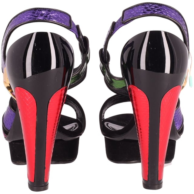 VINTAGE, RRP AS NEW
For your next party outing, adorn these Marc Jacobs sandals for a glamorous appearance. The  heels and platforms of this pair will effortlessly class up your looks. Created from snakeskin embossed multicolor leather, it features a colorful display and a slingback straps.

Marc Jacobs Color Block Heart Platform Heel Sandals in Multicolor Leather
Condition: Excellent 
Sign of wear: Fair lint on shoes: removable, some white marks on midsoles
Size:  EU 39/US 9
Color: Multicolor
Material: Leather
SKU: 161852