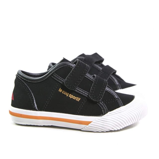 Basket Le Coq Sportif Deauville inf Jungen Schwarz Synthetik. Authentischer Schuh der Marke Le Coq Sportif - Streetwear/Sportswear Design von Le Coq Sportif - Le Coq Sportif für modebewusste Jungen, perfekt für den Alltag - Basket Le Coq Sportif in Schwarz lässt sich ideal mit der restlichen Garderobe kombinieren - bequeme Synthetikmaterialien - klassischer Klettverschluss - Deauville inf - Synthetik.