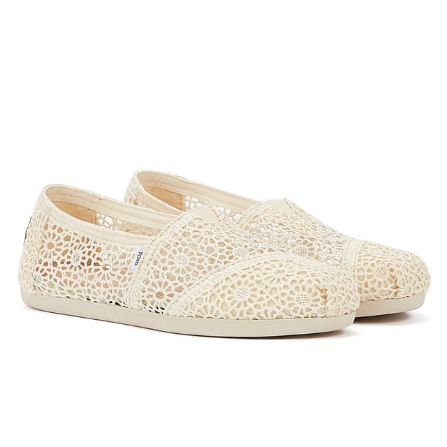 Experience ultimate comfort and style with our exquisite crochet uppers, complemented by the cutting-edge TOMS CloudBound Sole. Crafted to provide exceptional comfort, cushioning, and traction, these shoes are a true delight for your feet. The textile upper is not only trendy but also 100% vegan, making it a perfect choice for conscious consumers. With a removable insole and elastic gore for effortless on-and-off, these shoes are designed to enhance your convenience. Step into a world of comfort and sustainability with our remarkable footwear.