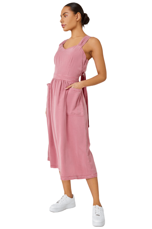 Dyed Strappy Pocket Dress from Roman. It's time to refresh your denim collection by adding this statement detail fit and flare midi dress to your summer wardrobe! This classic feminine piece features a sweetheart halter-neck into back tie detail and front pockets. This timeless one-piece looks great with trainers for an effortless daytime look, alternatively paired with wedges and a sun hat for those stylish city holiday summer breaks abroad.