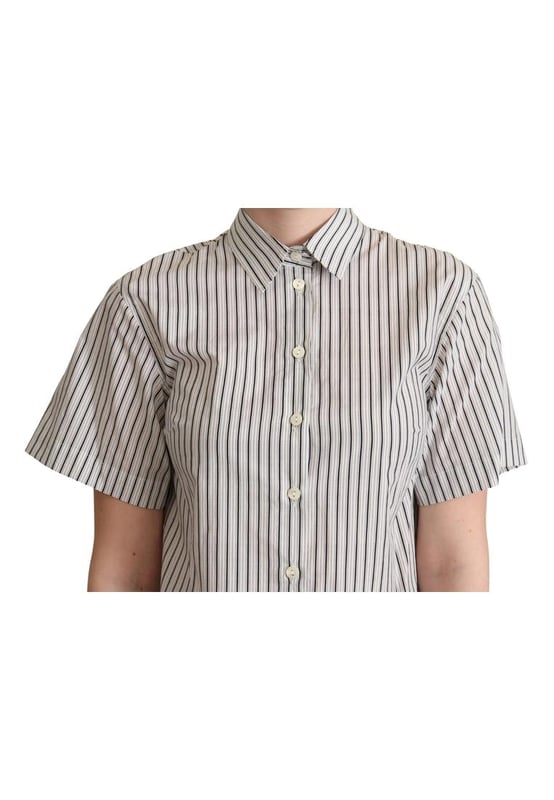 A estrenar con etiquetas.
  Polo de algodon 100% autentico de Dolce & Gabbana.
  Diseno de rayas en blanco y negro.
  Cuello tapeta de botones en la parte delantera y mangas cortas.
  Detalles del logotipo.
  Fabricado en Italia.