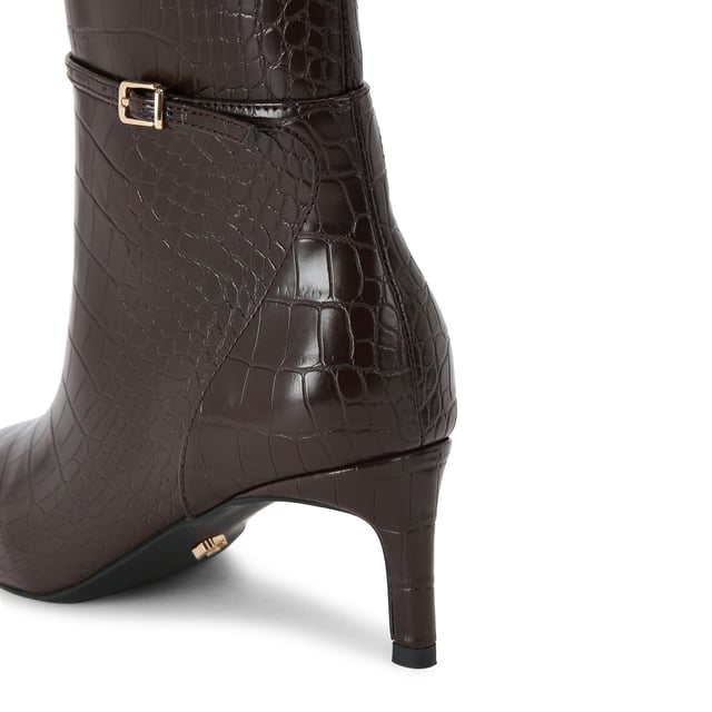 This KG Kurt Geiger Impress Ankle Boot features a brown croc embossed upper. There is a thin ankle strap around the ankle with gold tone buckle. Heel height: 6cm.