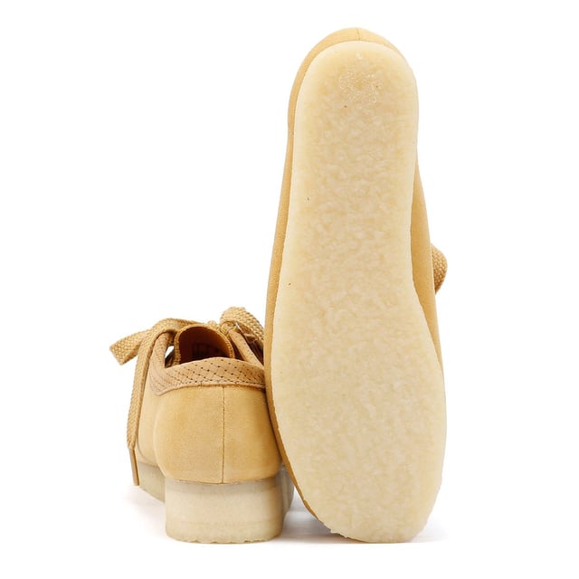 Launched in 1964, the moccasin-inspired Wallabee, with its clean and simple lines, has become an iconic Clarks design. Crafted from premium suede, it comes with a lace up fastening and distinctive contrasting crepe sole.