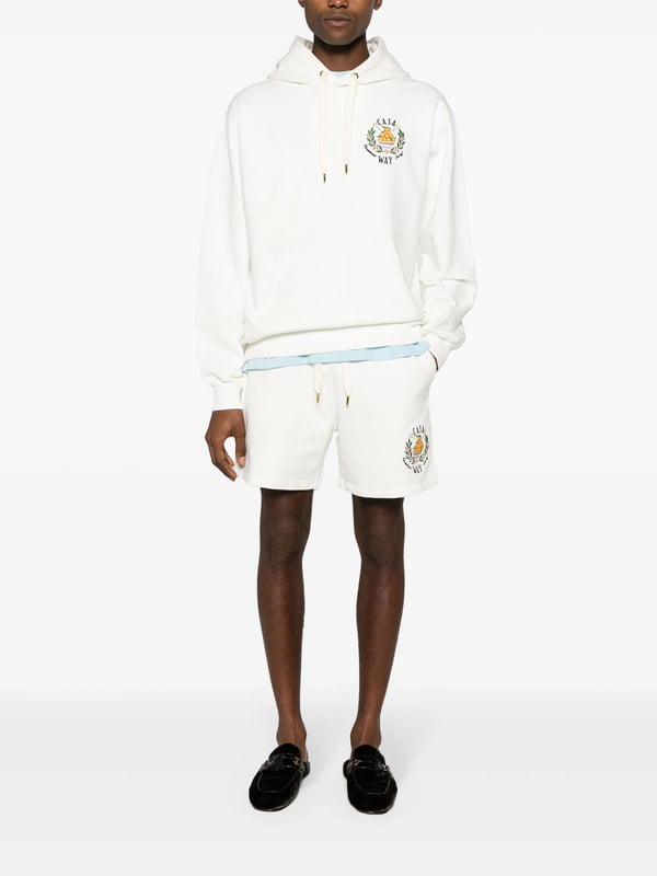 A crest motif is embroidered at the chest of this Casa Way hoodie from Casablanca, referencing the brand's country club-inspired aesthetic.