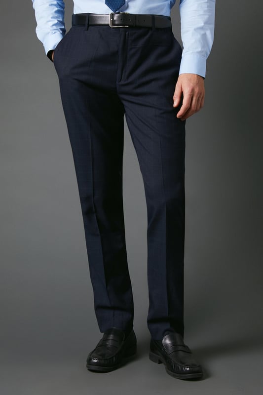 Slim fit design for a modern, tailored silhouette
        Distinctive windowpane check pattern adds visual interest
        Belt loops for versatile styling options
        Tapered leg for a sleek, contemporary look
        Suitable for smart casual to formal occasions
    
    These Burton slim fit trousers present a sophisticated option for the discerning gentleman. The windowpane check pattern introduces a subtle yet stylish element, perfect for those who appreciate classic designs with a contemporary twist. Ideal for smart casual events or more formal occasions, these trousers offer versatility in your wardrobe. Style them with a crisp button-down shirt and polished brogues for a refined office look, or pair with a lightweight jumper and smart trainers for a more relaxed weekend ensemble. The slim fit and tapered leg create a streamlined silhouette that's both flattering and on-trend, making these trousers a go-to choice for the modern man who values both style and comfort in his attire.