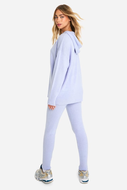 Soft knit co-ord set featuring a hoodie and trousers
        Relaxed fit hoodie with long sleeves and ribbed cuffs
        Matching high-waisted trousers with a slim fit
        Comfortable stretch fabric for all-day wear
        Versatile two-piece set for effortless styling
    
    Embrace comfort without compromising on style with this soft knit co-ord set from Boohoo. The relaxed fit hoodie pairs perfectly with the slim-fit trousers, creating a harmonious silhouette that's both trendy and cosy. Ideal for casual outings, this set can be dressed up or down with ease. Layer the hoodie over a simple tee and pair with trainers for a laid-back look, or style the trousers with a cropped top and heels for a night out with friends. The stretchy fabric ensures comfort for lounging at home or running errands. For a sporty twist, take inspiration from the model and team with chunky trainers and a roomy tote bag. This versatile co-ord is a must-have for the fashion-forward woman who values both comfort and style in her everyday wardrobe.